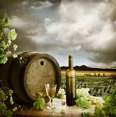 White wine and vineyard in vintage style clipart