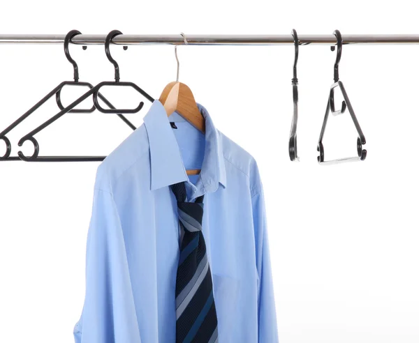 Clothes hanger with one man's shirts — Stock Photo, Image