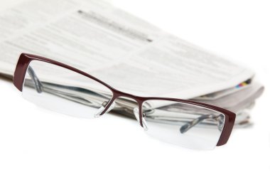 Eyeglasses and newspaper clipart