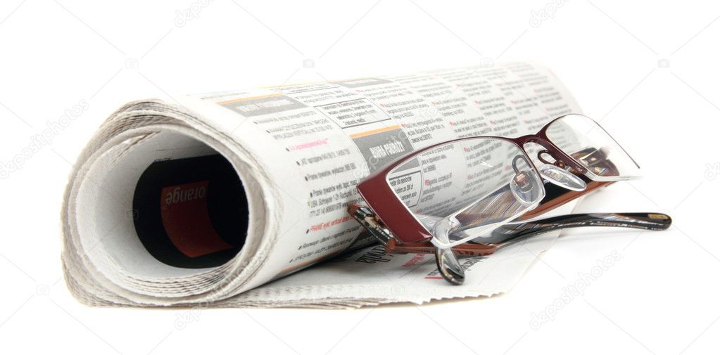 Roll of newspapers with eyeglasses , isolated on white background
