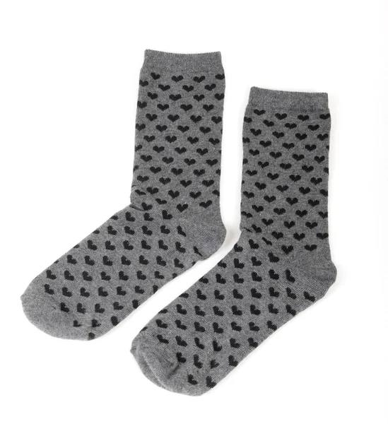 Paar van grijze sokken met kleine harten — Stockfoto