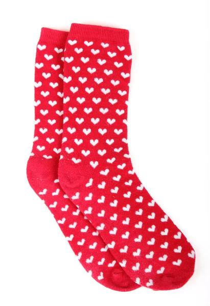 Röda strumpor med vita hjärtan — Stockfoto