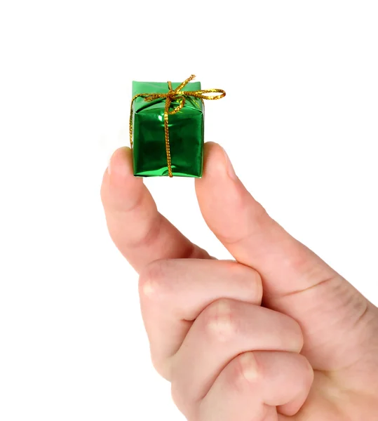 Small green present in man's hands — Stock Photo, Image