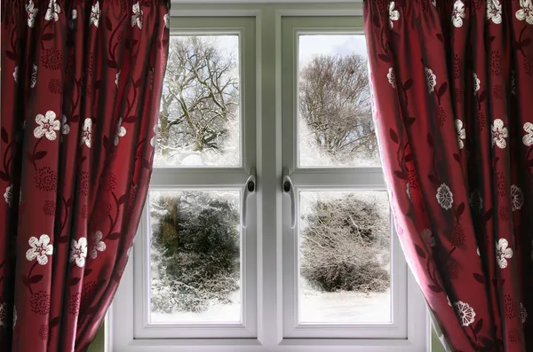 Window view to a snow scene — Stock Photo, Image