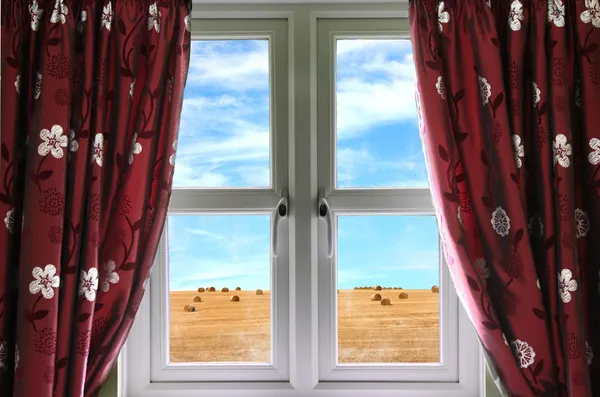 Window and curtains with view of crops — Stock Photo, Image