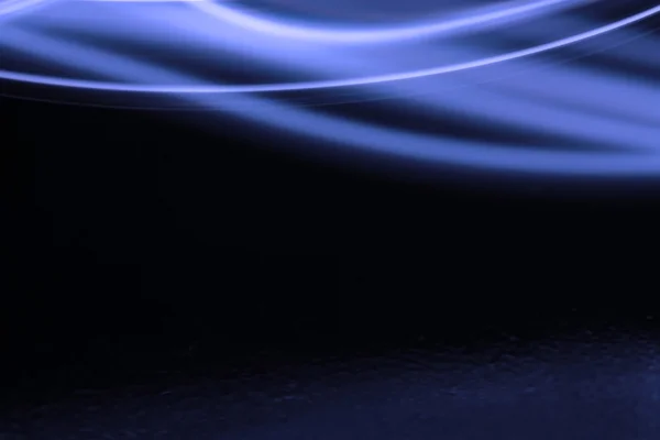 Swish azul sobre negro — Foto de Stock