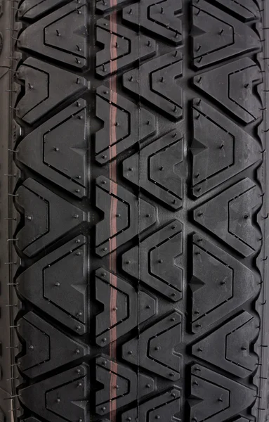 Rastreamentos de pneus de perto — Fotografia de Stock