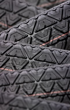 Tyres stacked with focus depth clipart
