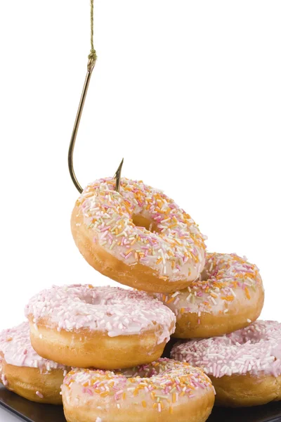 stock image Doughnuts being hooked