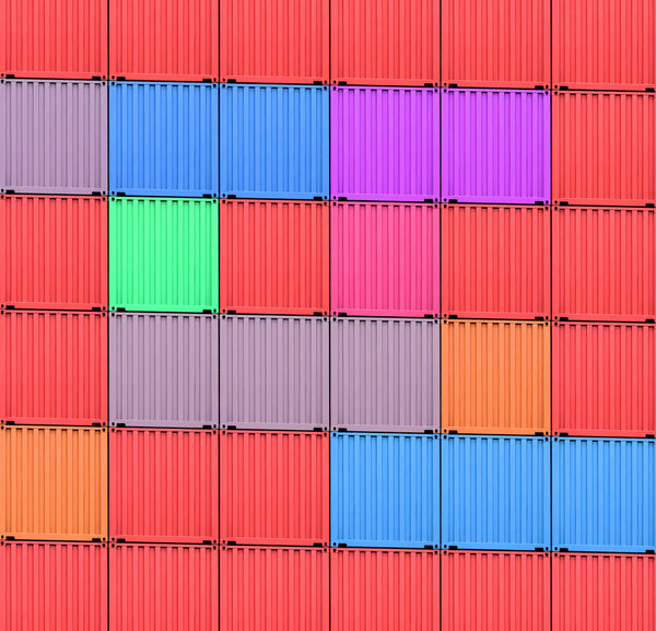 Background of multi-colored freight shipping containers at the docks