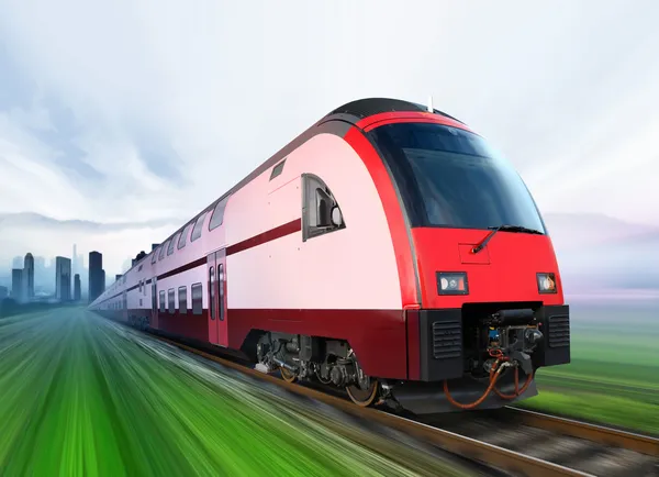 Train moves from city — Stock Photo, Image