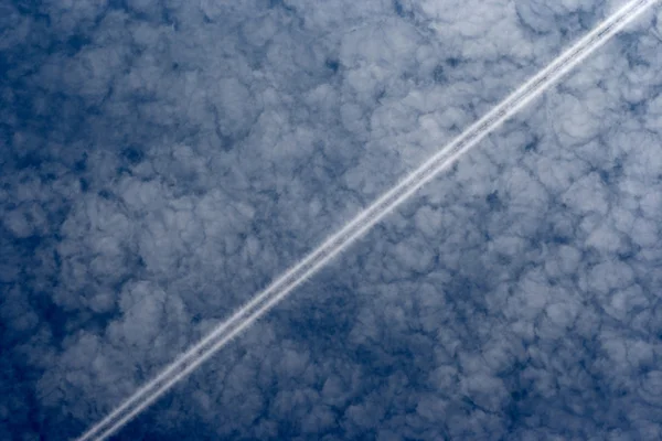 Condensed steam in the sky — Stock Photo, Image