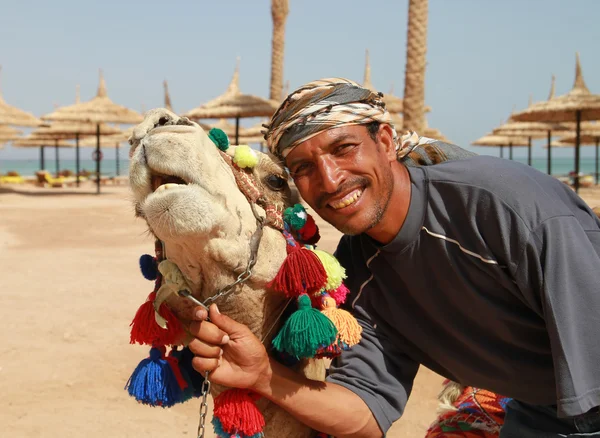 Bedouin and his camel portrait — Stock Photo, Image