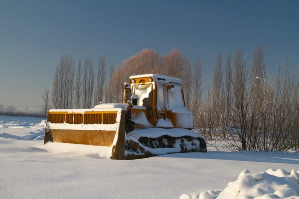 Bulldozer in snow — Stock Photo, Image