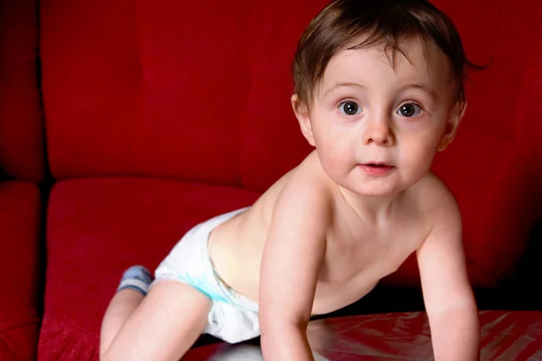 Naked baby boy in diaper — Stock Photo, Image
