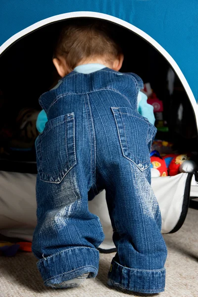 Cute baby butt in blue jeans — Stock Photo, Image