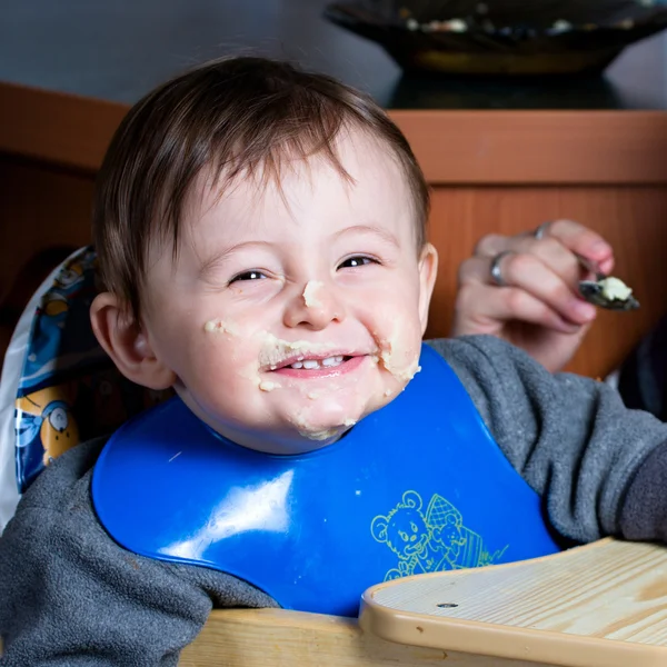 Smiling Portrait of a baby with a dirty face — Stock Photo, Image