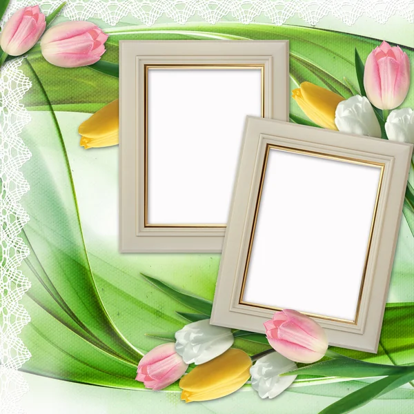 Drie foto frames en tulpen bloemen — Stockfoto