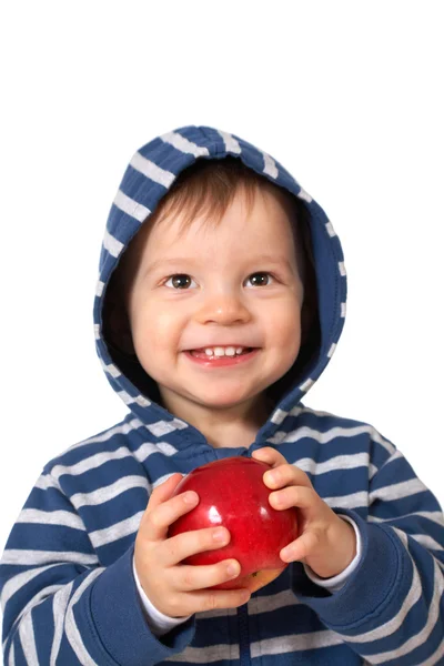Laughing baby with red apple — Stock Photo, Image