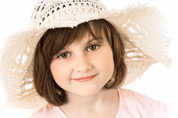 Sonriente chica en un sombrero — Foto de Stock