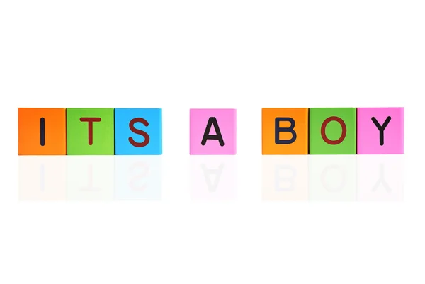 Frase ITS A BOY formado con bloques de letras de madera — Foto de Stock