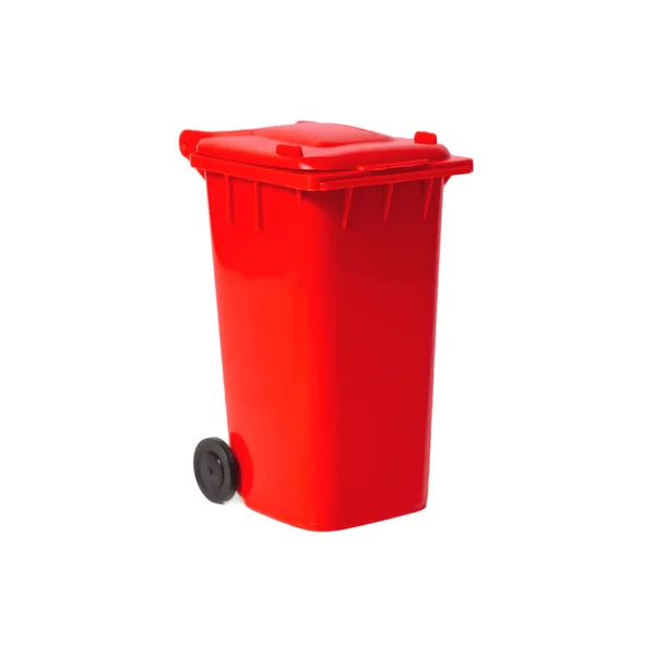 Красный пустой мусорный бак — стоковое фото