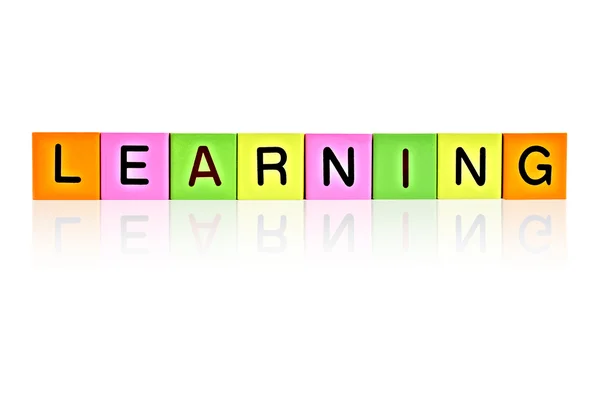 Word LEARNING format din blocuri de litere din lemn — Fotografie, imagine de stoc