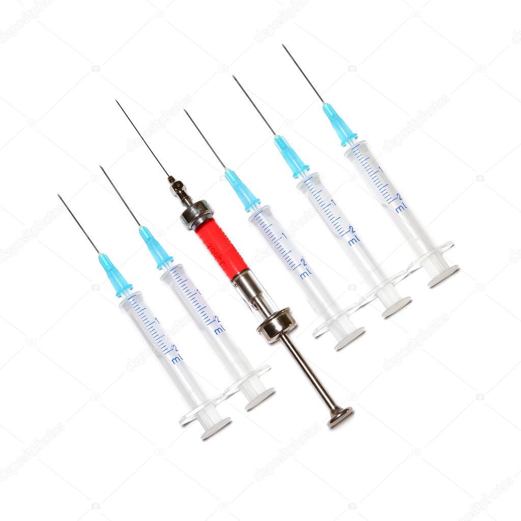 Six syringes in row on white background