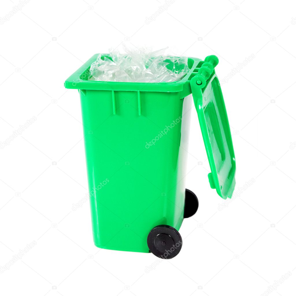 Full green recycling bin with plastic