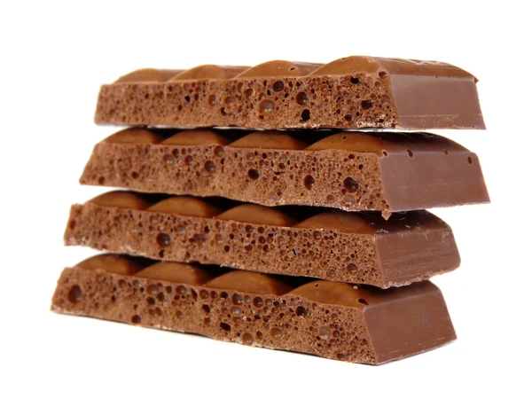 Chocolate isolado sobre fundo branco. Colagem — Fotografia de Stock