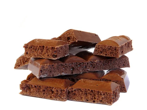 Chocolate isolado sobre fundo branco. Colagem — Fotografia de Stock