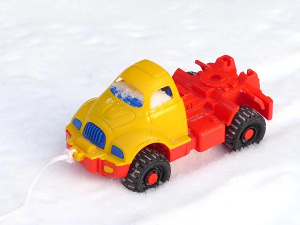 Gyerek műanyag gép a hó — Stock Fotó