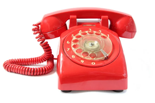 Винтажный красный телефон — стоковое фото