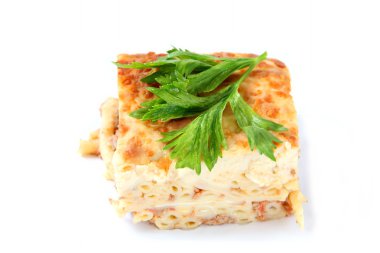 Casserole of macaroni isolated on a white background. Greek pastitsio. Lasagna clipart