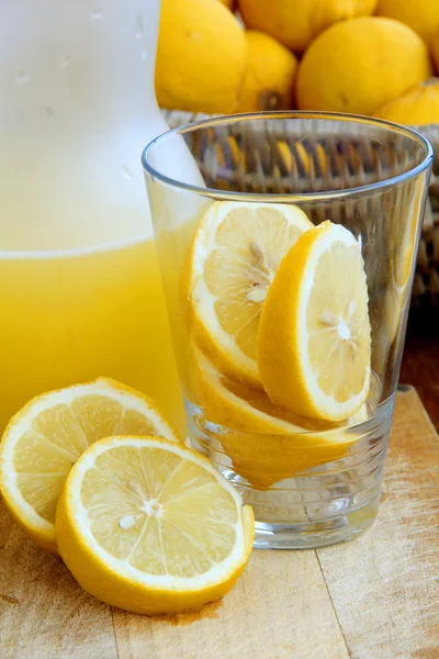 Ice Cold Lemonade on wooden background — Stock Photo, Image