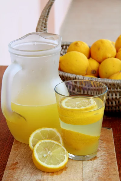 Ice Cold Lemonade on wooden background — Stock Photo, Image
