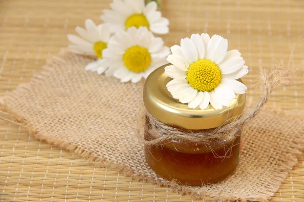 Honey on a wooden table — Stock Photo, Image
