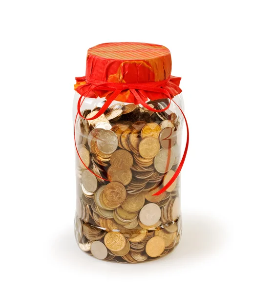 stock image Coins in a jar bank as a gift