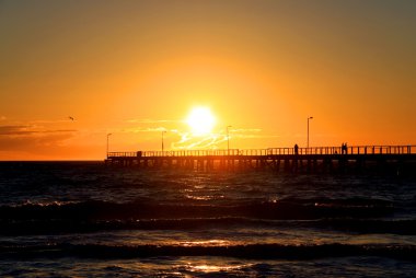 Sunset over Semaphore Jetty, Adelaide, Australia clipart