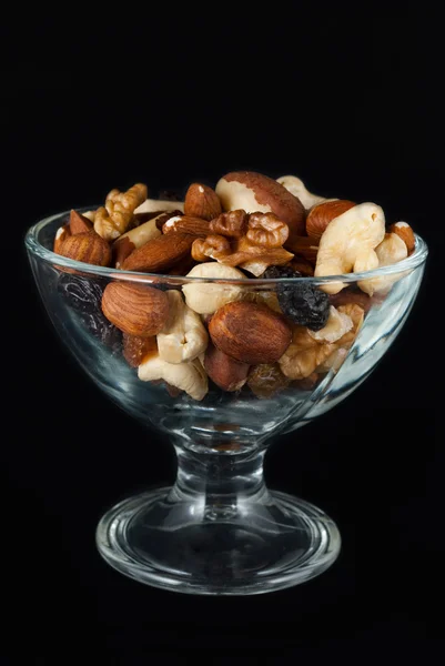 Dried fruits in glass vase Stock Picture