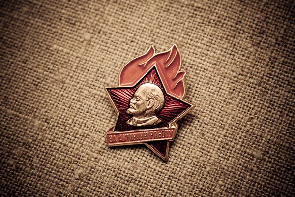 stock image Badge of the former Soviet Union with the image of man. The icon says 