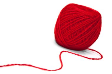 Red ball of yarn on white background clipart