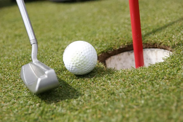 Putter, ball and hole — Stock Photo, Image