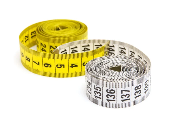 Žluté a bílé měřící páska — Stock fotografie