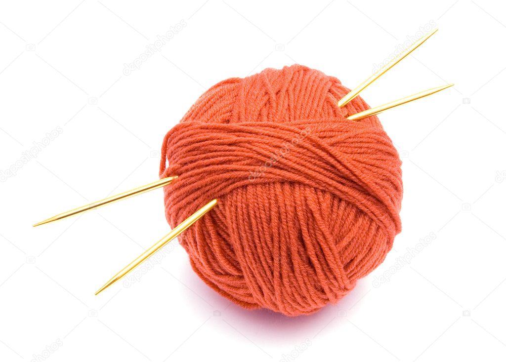 Red ball of wool and knitting needles