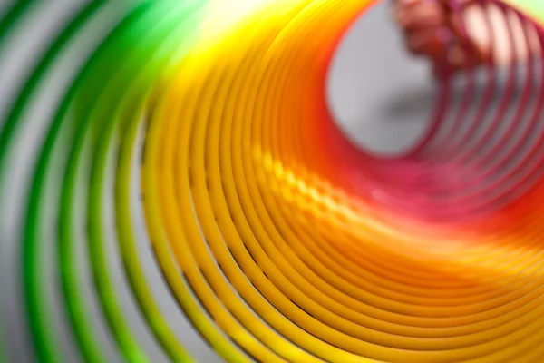 Colorful coil on a black background — Stock Photo, Image