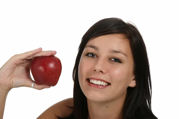 美女微笑着用一个新鲜的红苹果 — 图库照片
