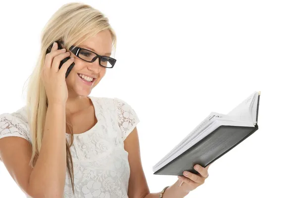 Beautiful Young Blond Woman Talking Mobile Phone Checking Her Diary — Stock Photo, Image