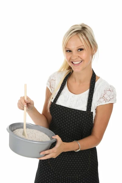 Mooie lachende blond koken dame — Stockfoto