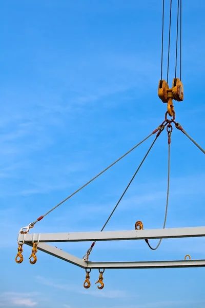 Shipping crane on blue sky background — Stock Photo, Image